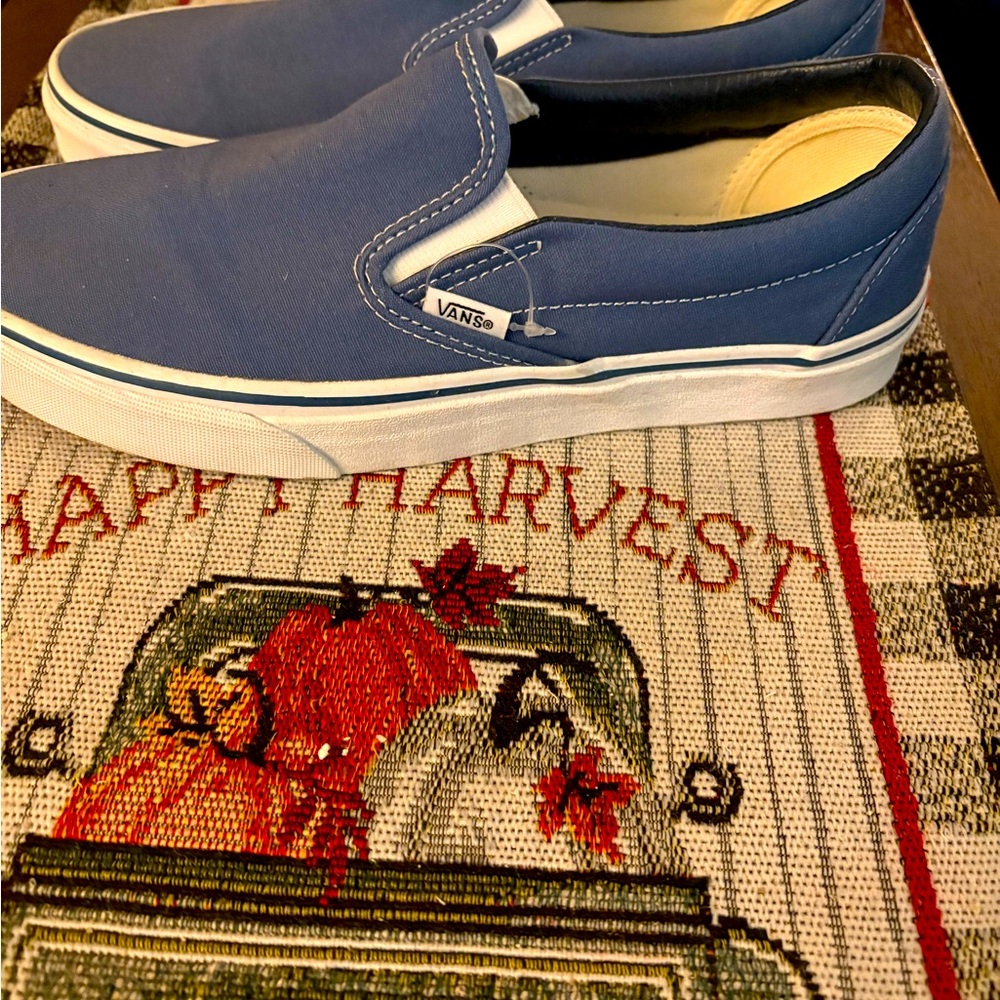 These are brand new never worn Vans slip ons.